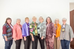 Julia Langel, Nancy Boewe, Judy Troyer, Pat Hernandez, Sylvia Steinshouer, Betty Brees, Marilyn Beaver and Vicki Mork modeling jackets made at a Linda Lee jacket workshop